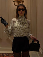 Blouse à pois à col montant