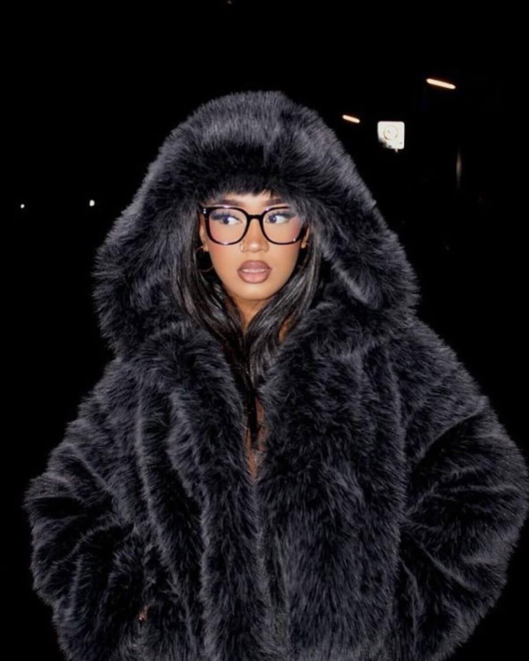Veste en fausse fourrure à capuche